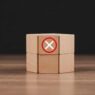71523067-de-madeira-blocos-com-uma-vermelho-circulado-x-simbolo-significando-rejeicao-negacao-cancelamento-ou-erro-em-uma-de-madeira-mesa-contra-uma-sombrio-fundo-foto