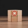 71523067-de-madeira-blocos-com-uma-vermelho-circulado-x-simbolo-significando-rejeicao-negacao-cancelamento-ou-erro-em-uma-de-madeira-mesa-contra-uma-sombrio-fundo-foto